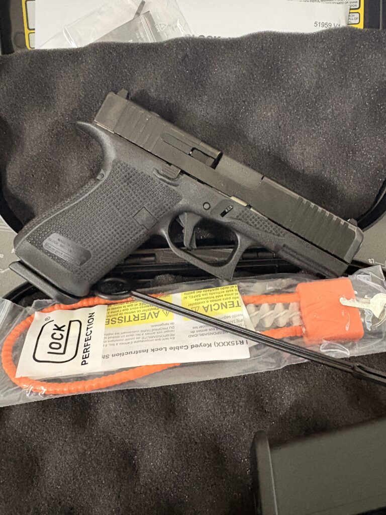 Close-up of firearm frame during FFL transfer inspection in Martinsburg WV